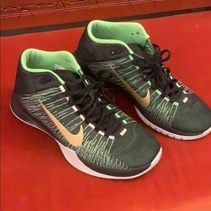 Nike barely worn army green and gold Nike logo
